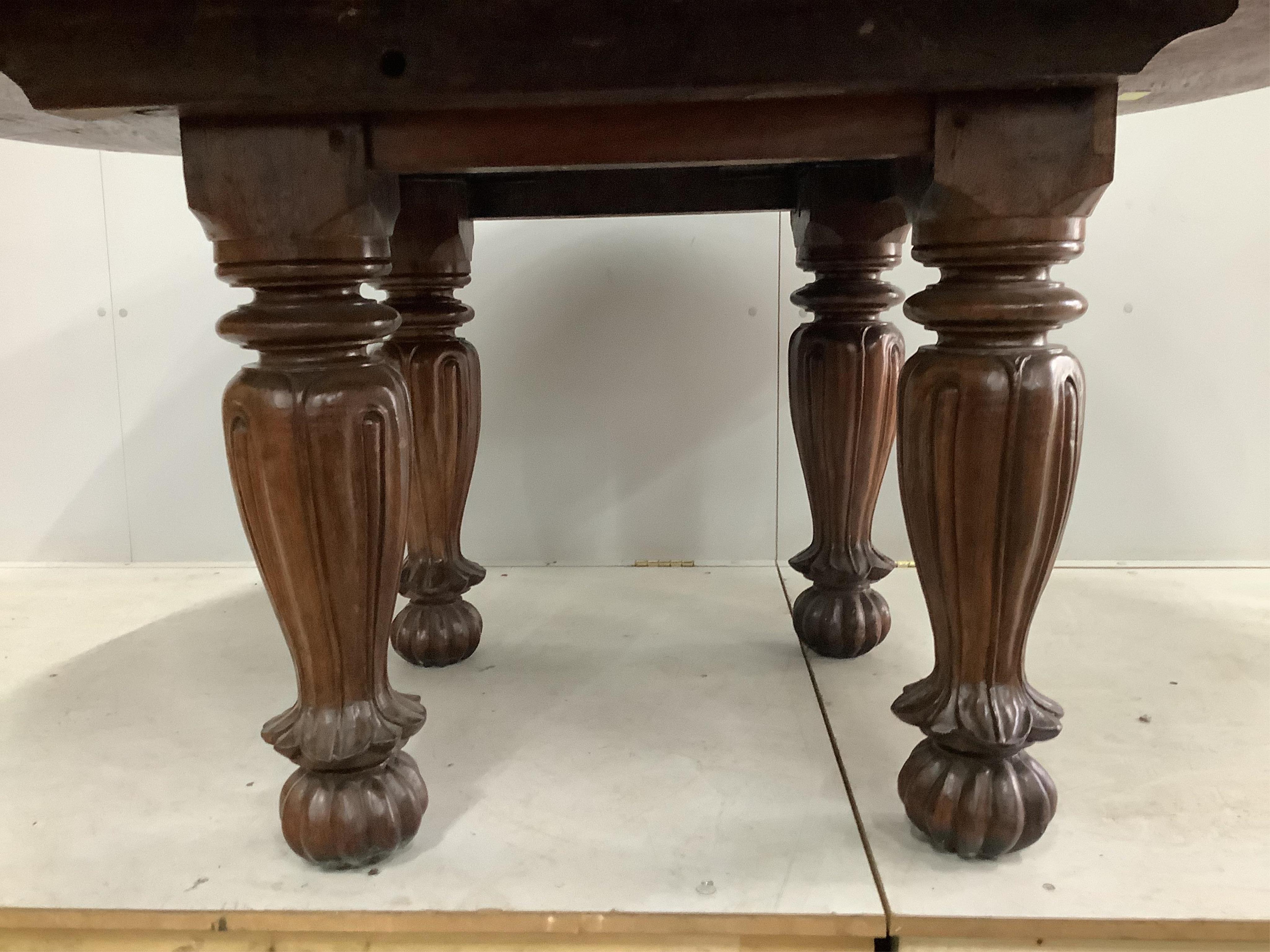 An Indian padouk wood circular top dining table, diameter 152cm, height 74cm. Condition - table has seen some reconstruction, repolished and now good condition